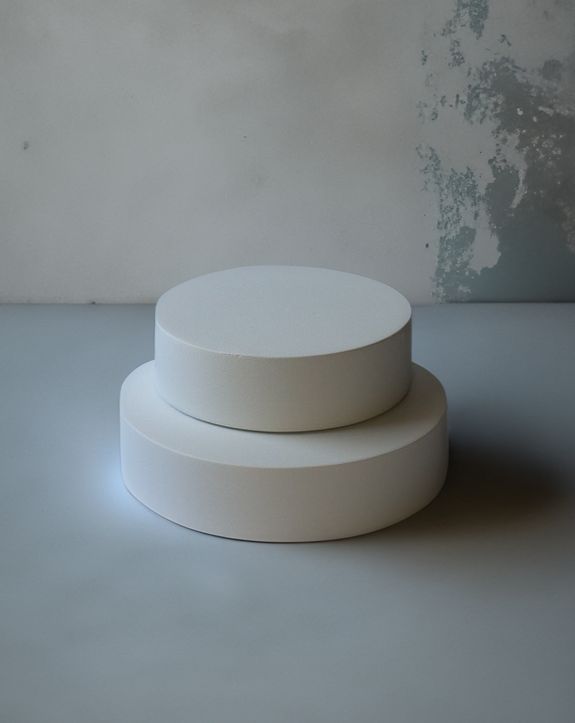 concrete ring display white cylinder tray